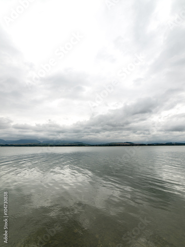Fototapeta Naklejka Na Ścianę i Meble -  Reflections in the calm lake water