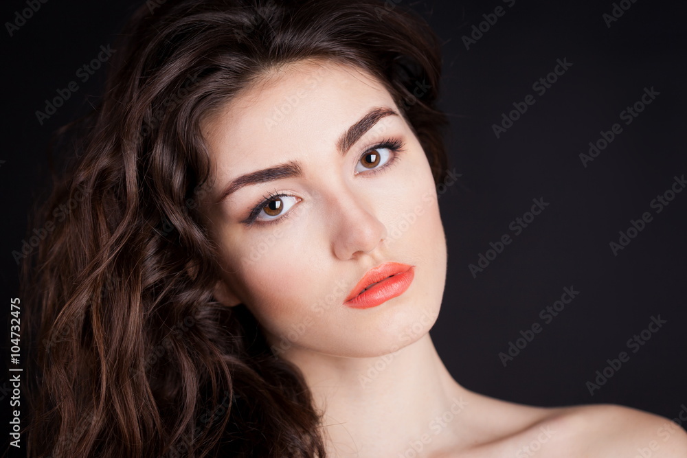 Fototapeta premium Alyona, serious face with brown eyes, black background