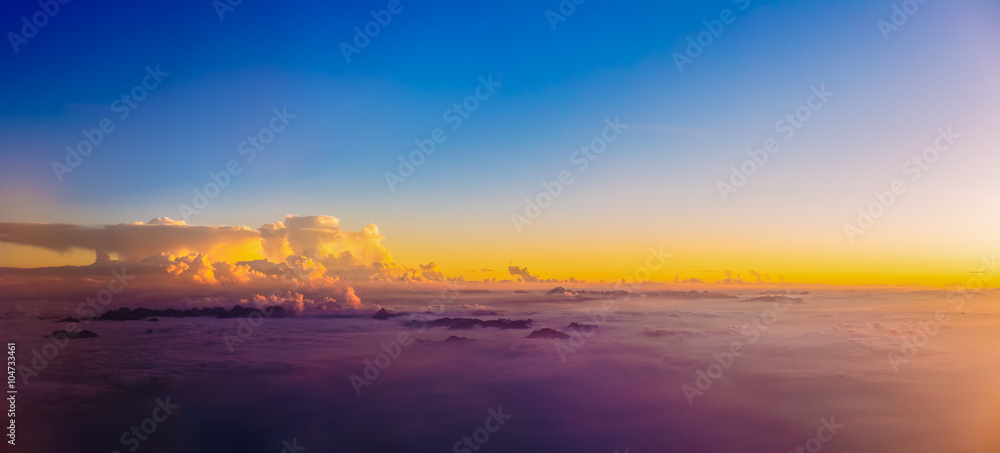 Beautiful panorama of sunset over mountains. Bright Blue, Orange