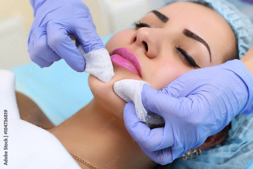 Professional cleansing of acne in a beauty salon. Professional cleansing of acne in a beauty salon.