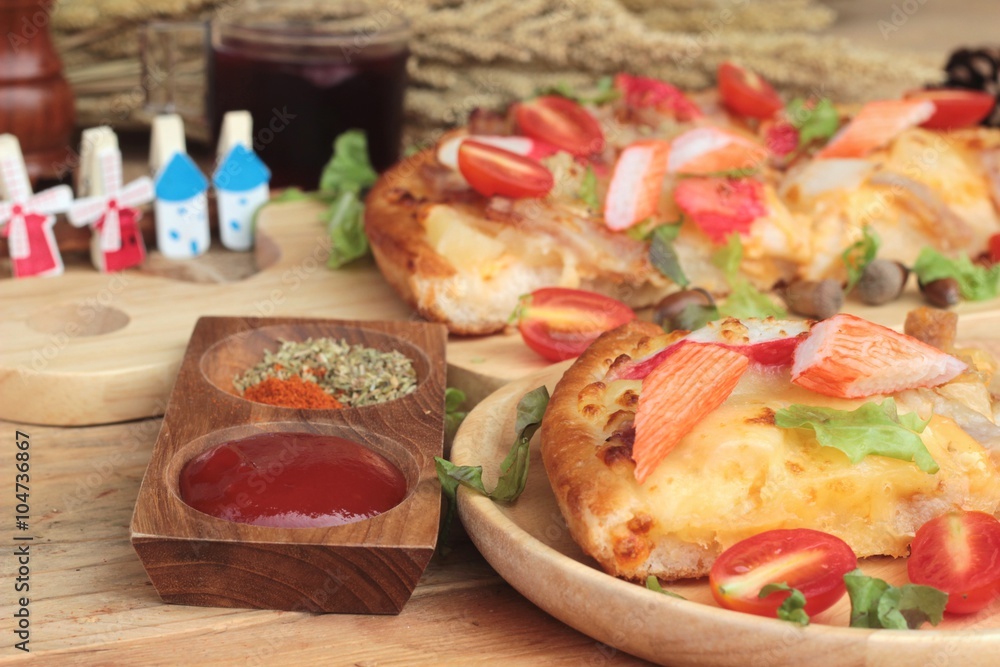 Italian pizza is delicious on wood background.