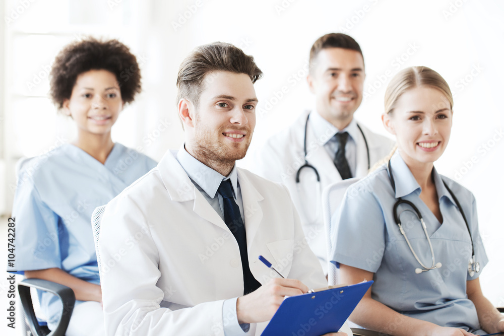 Fototapeta premium group of happy doctors on seminar at hospital