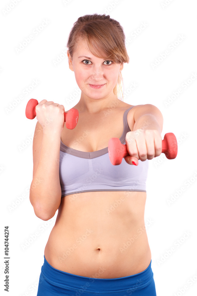 The girl goes in for sports with dumbbells on a white background. The girl goes in for sports with dumbbells on a white background.