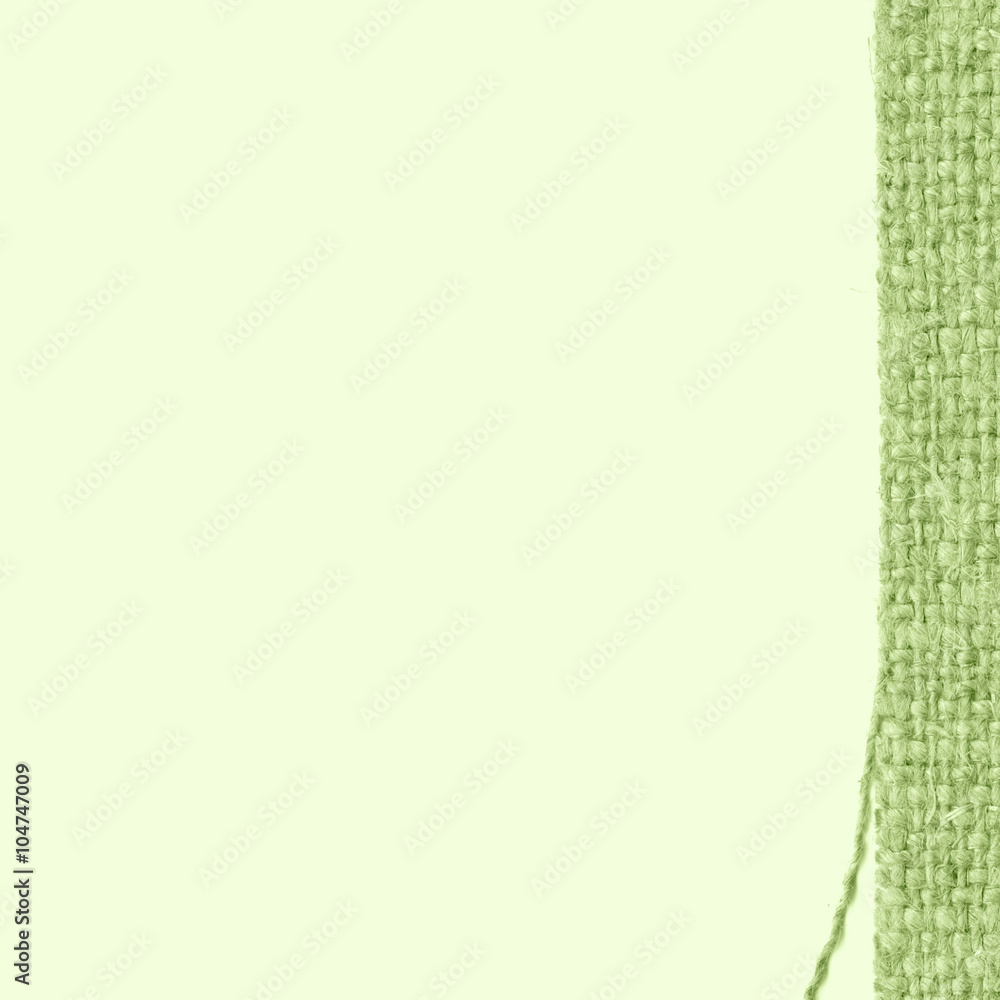 Textile yarn, fabric style, green canvas, cover material, retro-styled background Textile yarn, fabric style, green canvas, cover material, retro-styled background