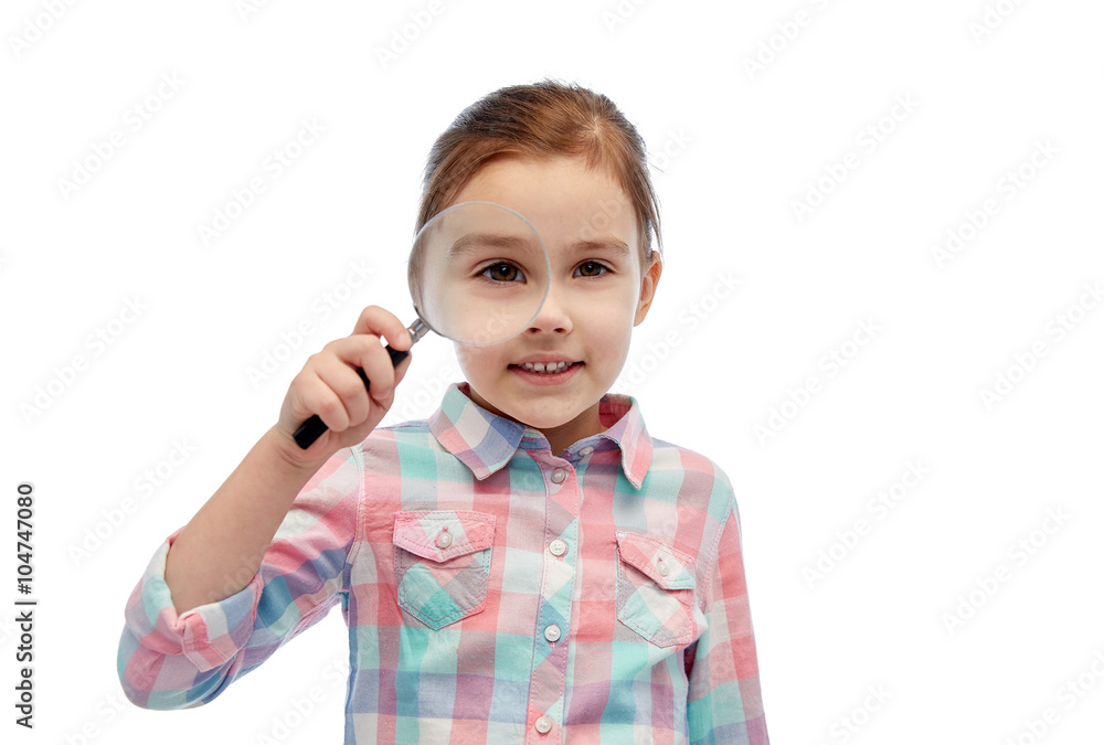 happy little girl looking through magnifying glass happy little girl looking through magnifying glass