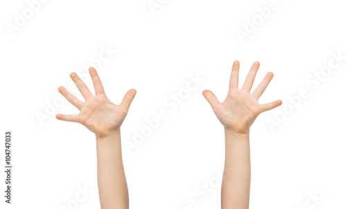 Obraz na plátně close up of little child hands raised upwards