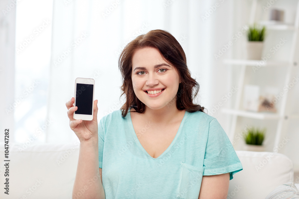 happy plus size woman with smartphone at home happy plus size woman with smartphone at home