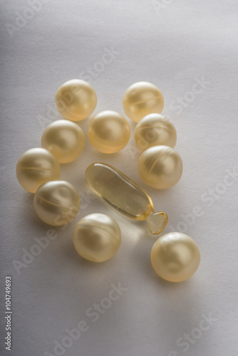 Gel capsules on the white background