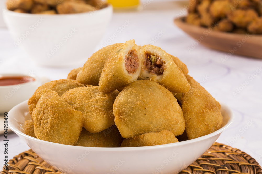 Rissole - Meat rissole served with chili sauce. Rissole - Meat rissole served with chili sauce.