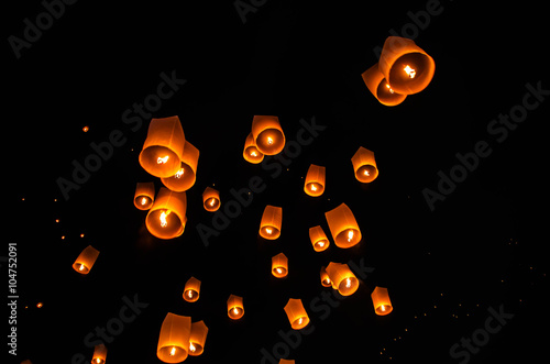 Floating lanterns ceremony or Yee Peng ceremony, traditional Lanna Buddhist ceremony in Chiang Mai, Thailand photo