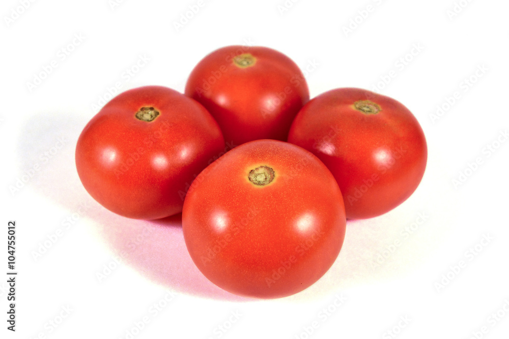 Four red tomatoes macro or close up isolated on white background Four red tomatoes macro or close up isolated on white background