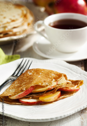 Crepes with apple and caramel sauce
