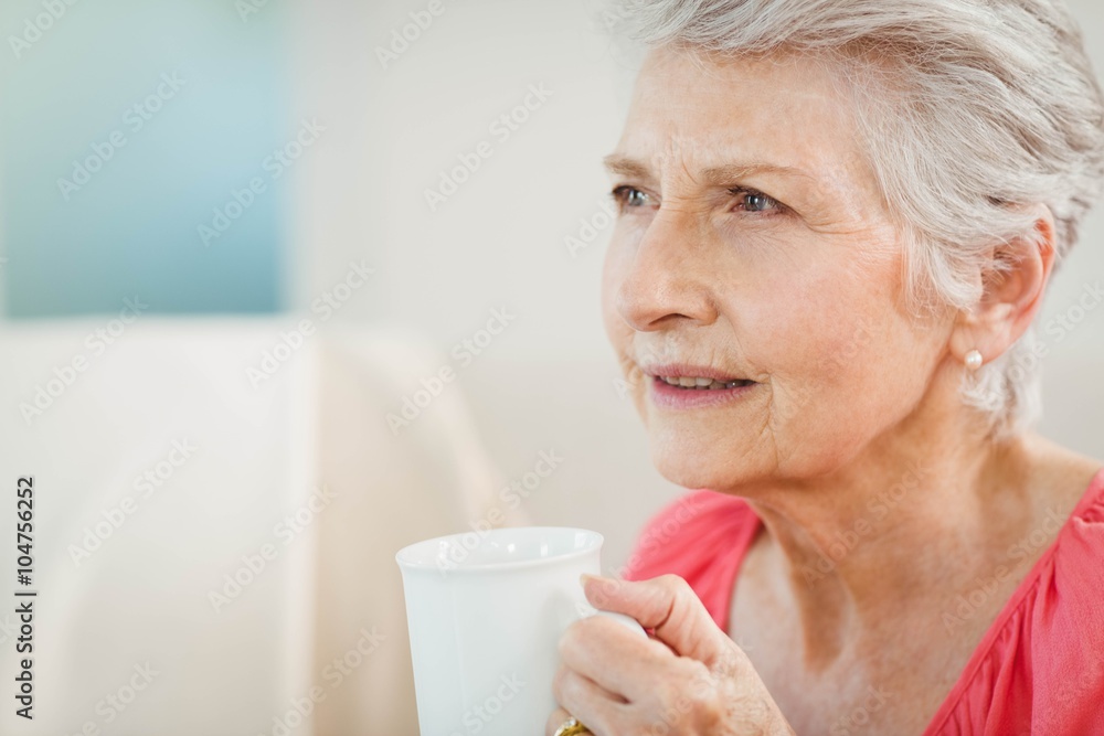 Senior woman drinking a cup of coffee Senior woman drinking a cup of coffee