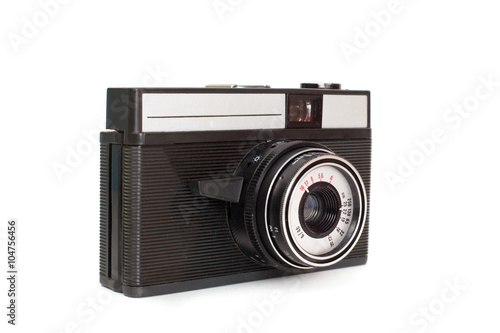 An old manual film camera, isolated on white background