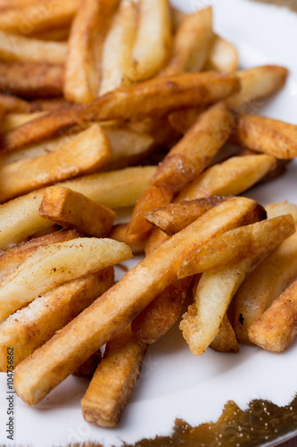 Close macro view of french fries on the plate