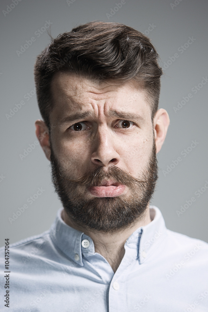 Obraz premium Close up face of discouraged man 