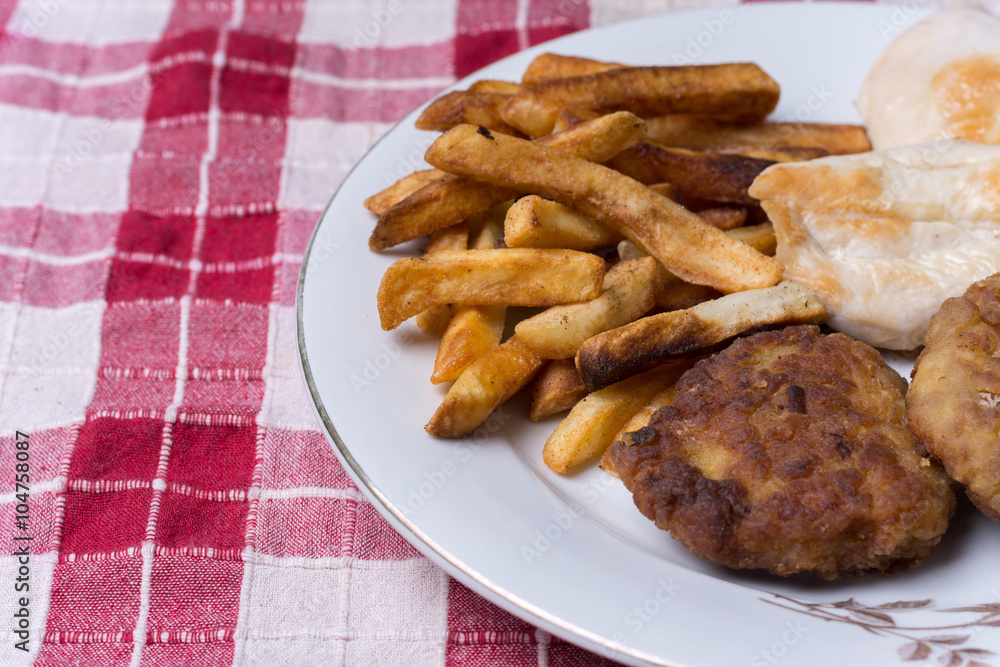 Served chichen meat beef meatballs and french fries Served chichen meat beef meatballs and french fries
