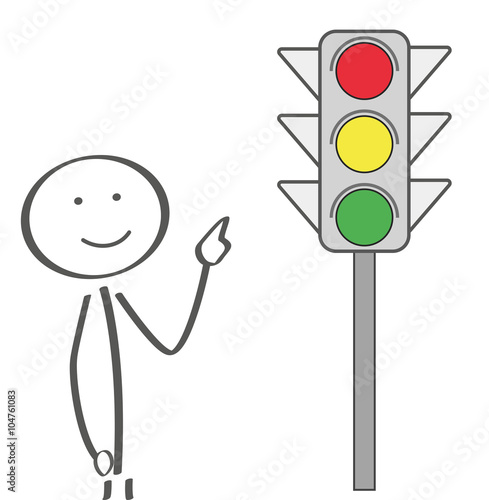Positives Männchen zeigt auf eine Ampel