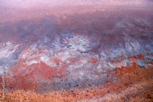 Close-up view on the ocean water on the salt pools on natural manufacturing on La Palma island in Spain © rh2010