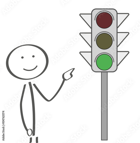 Strichmännchen deutet auf grünes Ampellicht