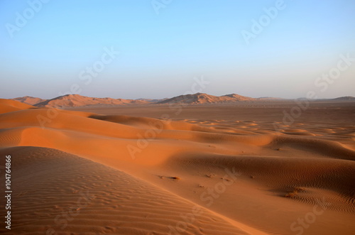 Panoramic view of sand dunes in Oman