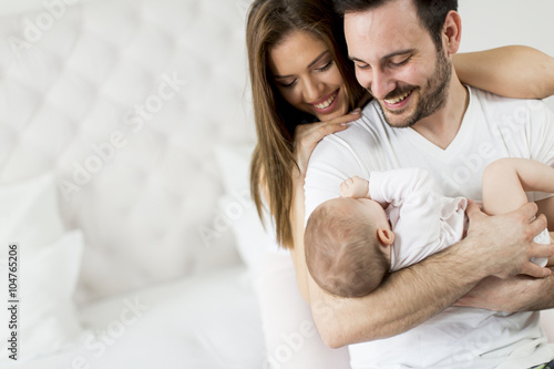 Happy family with newborn baby