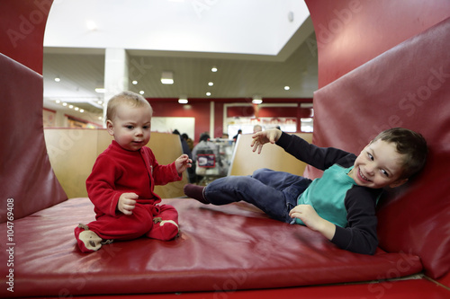 Two brothers on a sofa photo