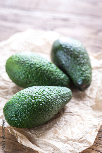Avocado on the wooden background