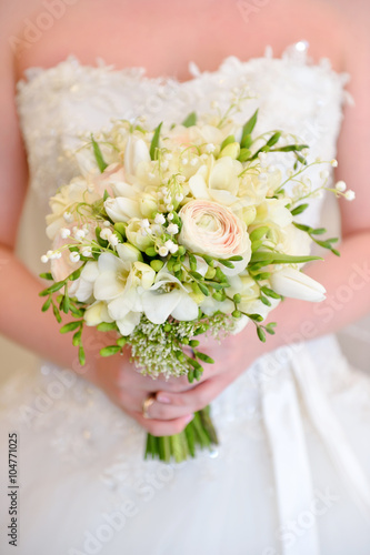 Wedding flowers in her hands