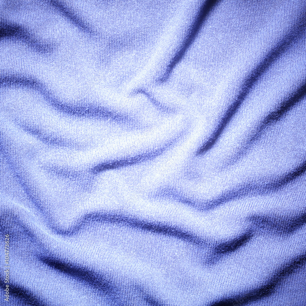 Dark blue crumpled fabric background Dark blue crumpled fabric background
