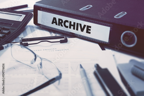 Fotografija Archive - Ring Binder on Office Desktop with Office Supplies
