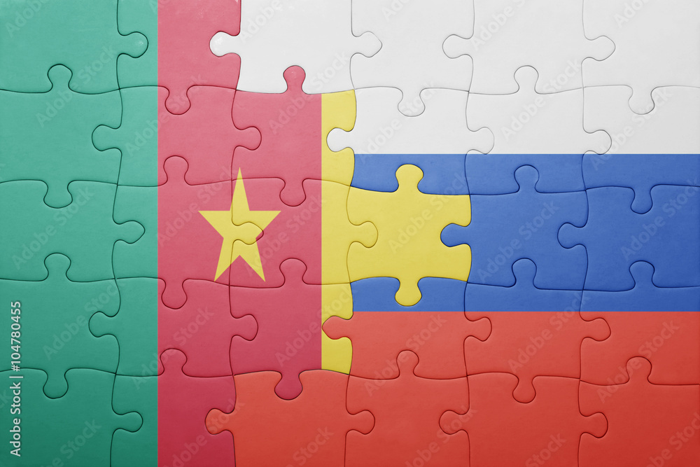 puzzle with the national flag of russia and cameroon
