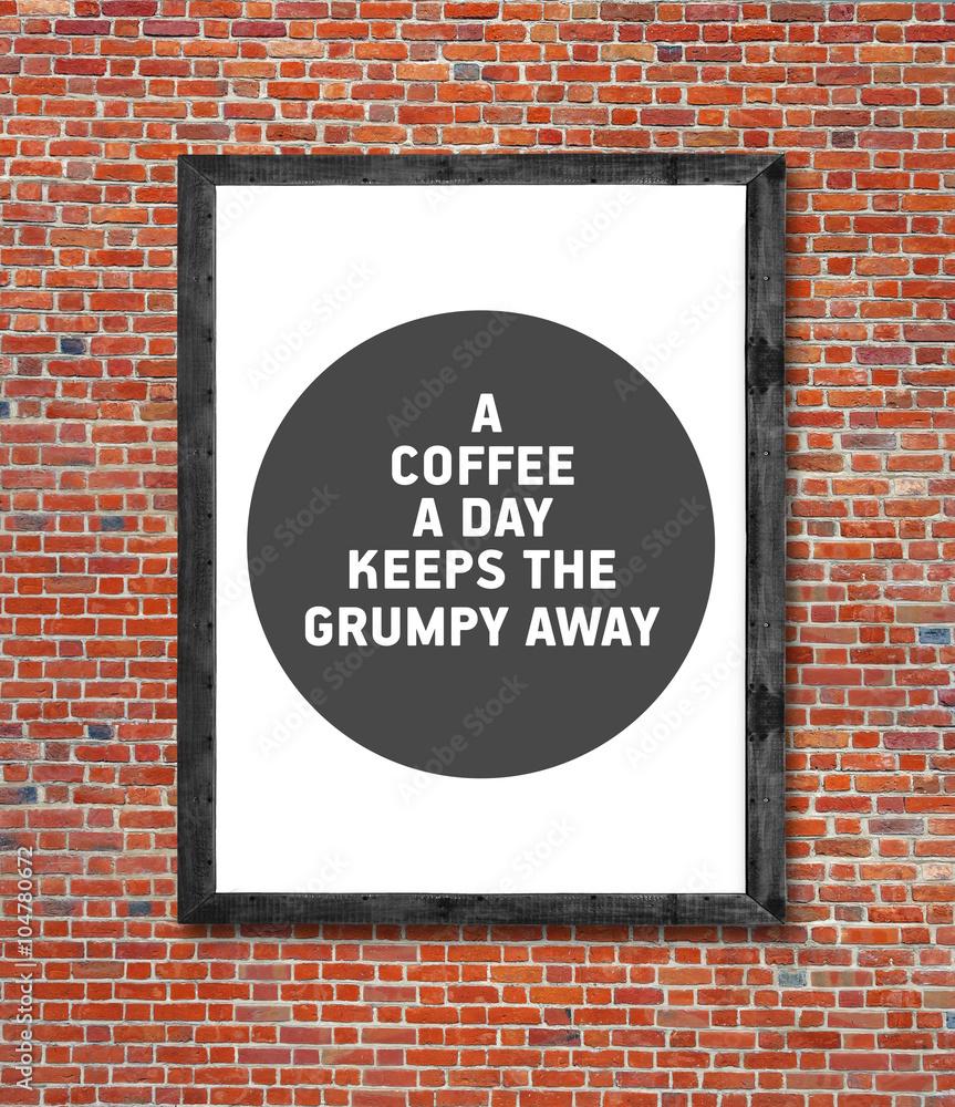 Fototapeta premium A coffee a day written in picture frame
