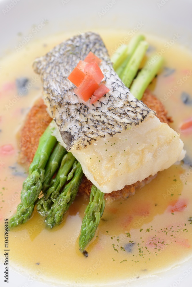 Braised cod fish on top of Asparagus and potato Braised cod fish on top of Asparagus and potato