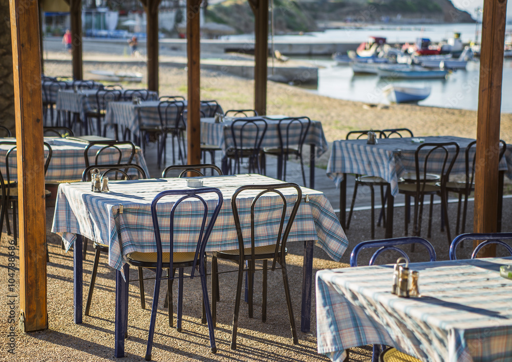 Greek tavern with blue chairs, Greece