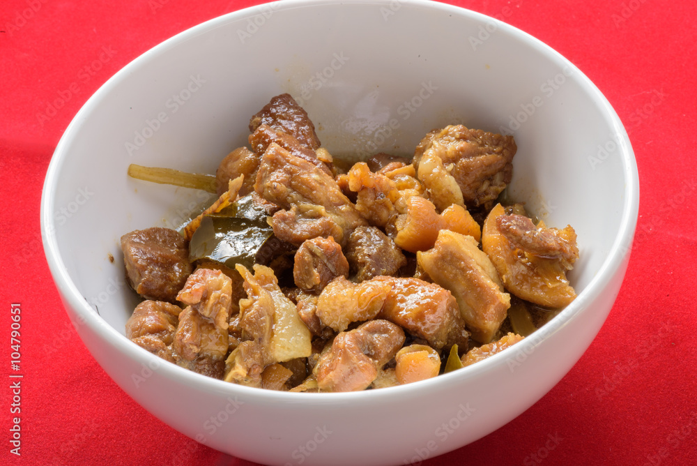 chinese herb pig legs boil on red background chinese herb pig legs boil on red background