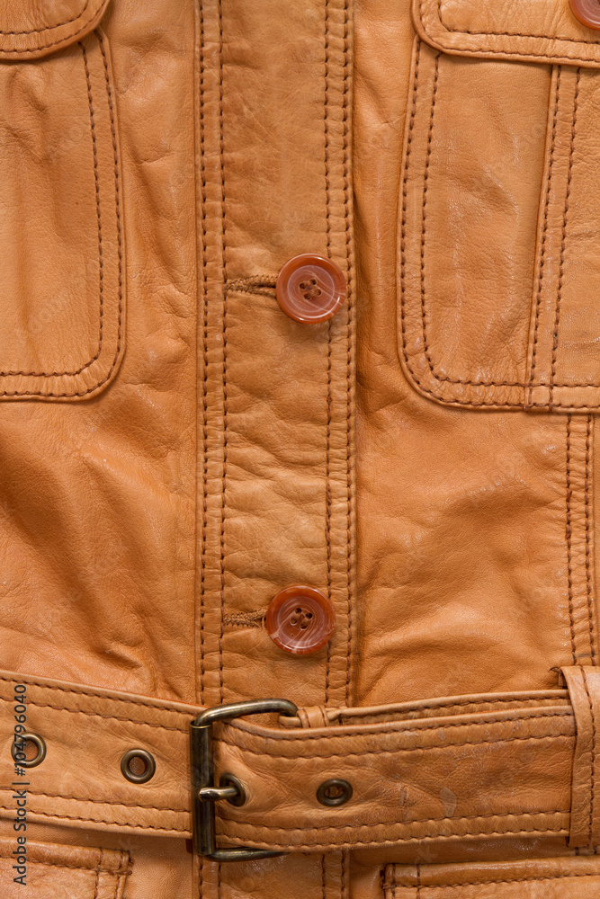 Texture a shabby brown leather jacket.
