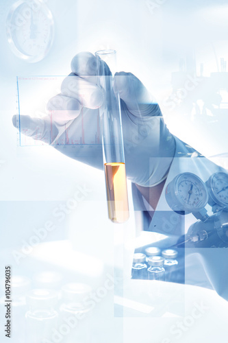 scientist hand with laboratory background