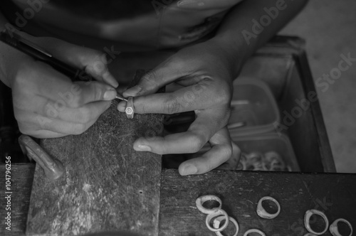 Working desk for craft jewelery making with professional tools.