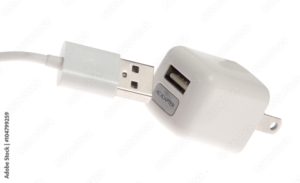 White adapter Charger with usb cable on white background White adapter Charger with usb cable on white background