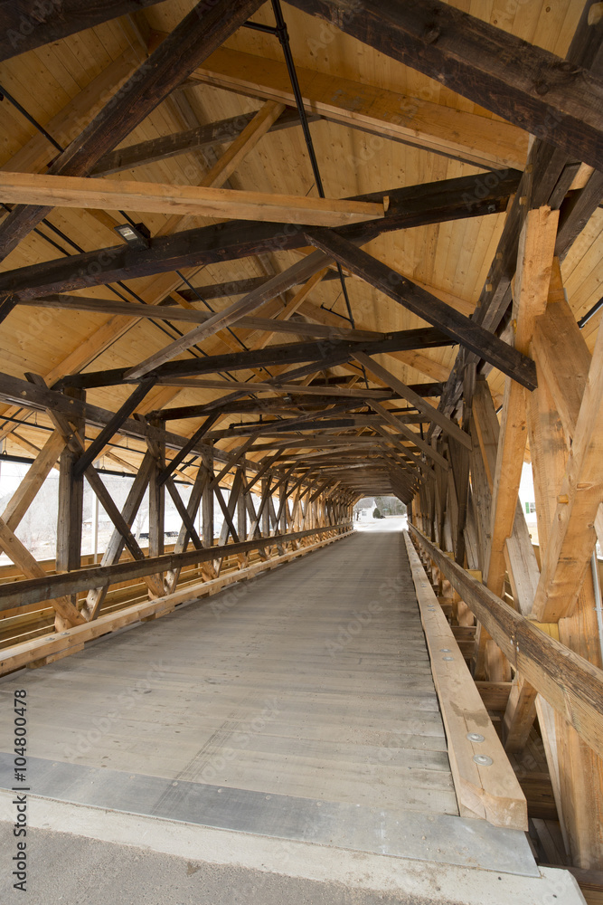Interior beams of historic wooden covered bridge, Stark, New Hampshire.