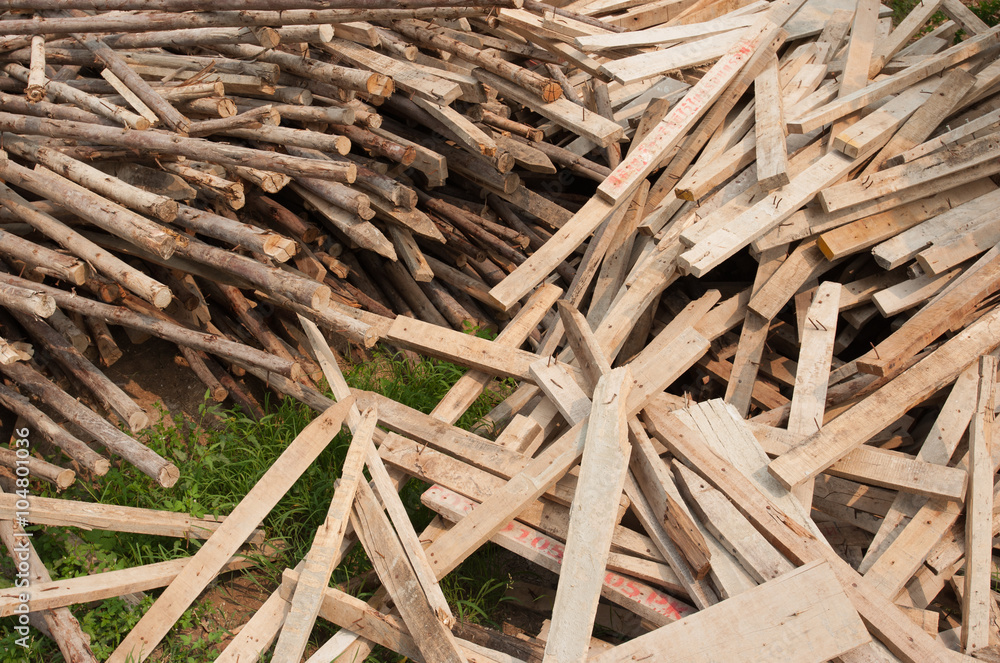 Pile of old and dirty lumber in construction site Pile of old and dirty lumber in construction site