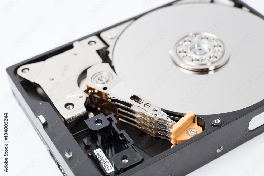Inside Hard Disk Drive (HDD)-Computer Hardware Components Focus on Actuator  Arm. Stock Photo | Adobe Stock