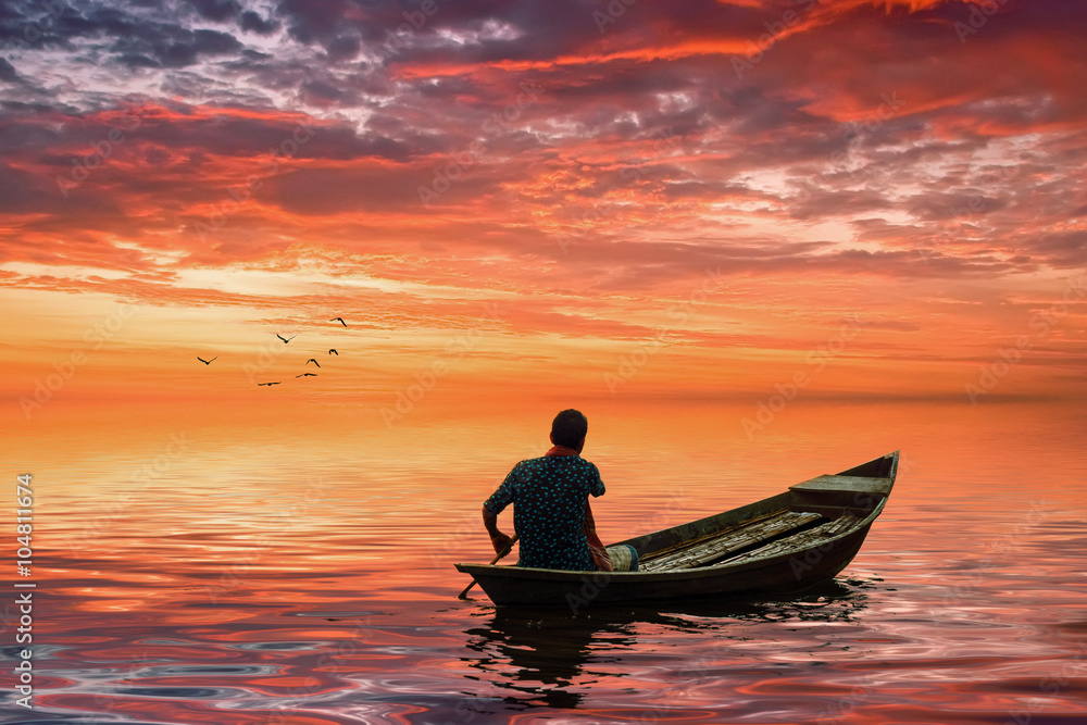 A man riding boat in bangladesh