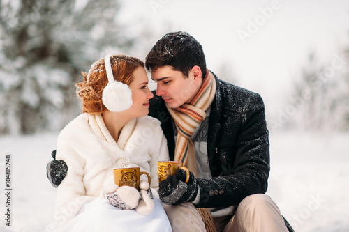 couple in a pine forest