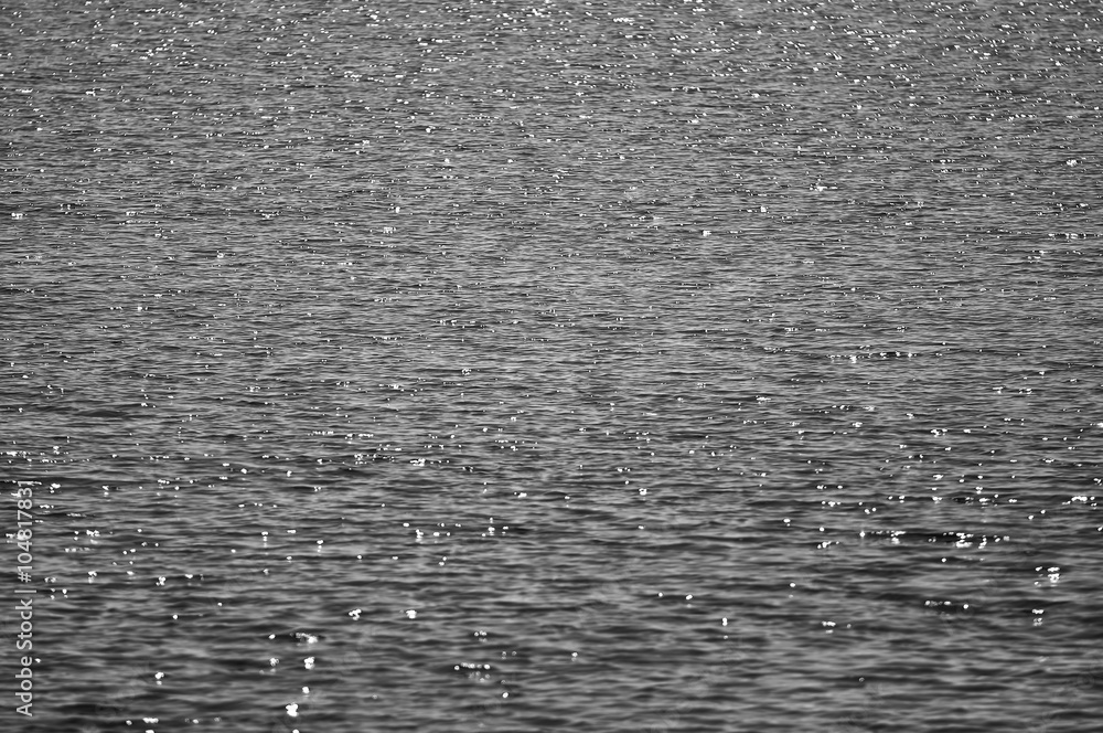 Selective Focus Of Water surface with waves glittering in black Selective Focus Of Water surface with waves glittering in black