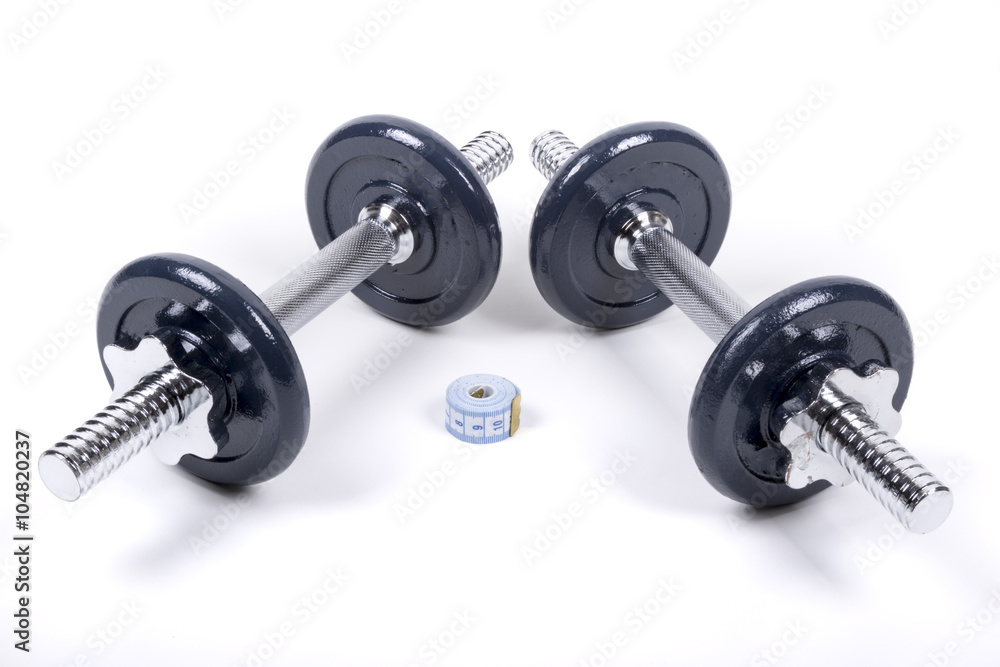A Pair Of Dumbbells And A Tape Measure A Pair Of Dumbbells And A Tape Measure