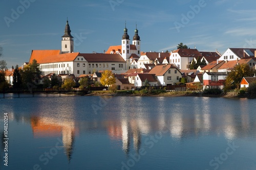 Evening view of Telc or Teltsch town mirroring in lake