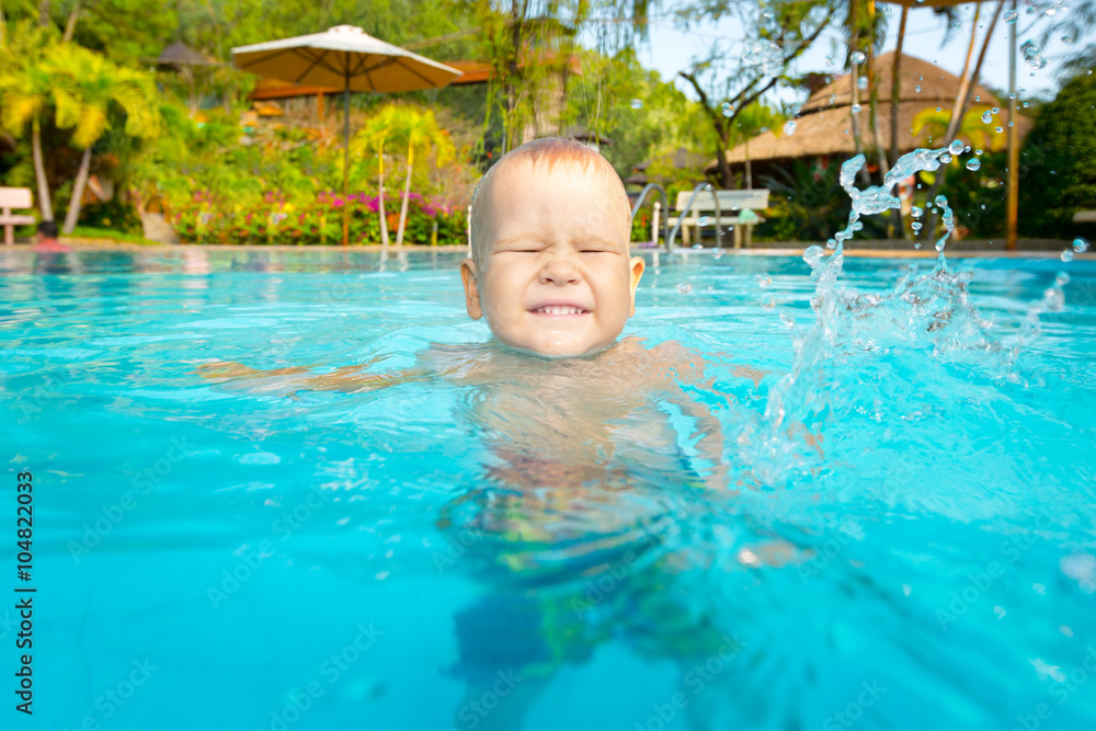 Boy in swimming pool