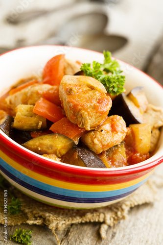 Pork stew with pepper, eggplant and tomatoes